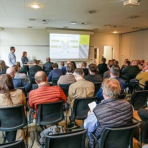 Publikum beim Fachvortrag